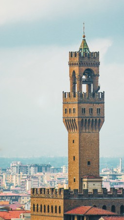 the ancient tower of Palazzo Vecchio in Florenceの写真素材