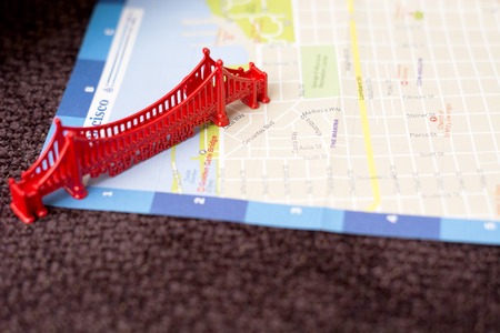 golden gate bridge miniature on a blurred map of San Franciscoの写真素材