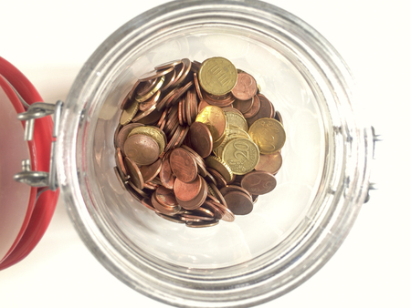 aerial view of euro coins in a glass jar