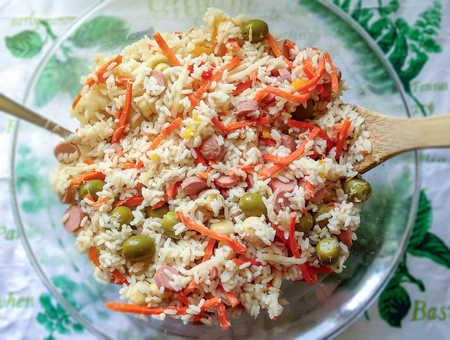Appetizing healthy rice with vegetables in a glass plate. Selective focus. Top viewの写真素材
