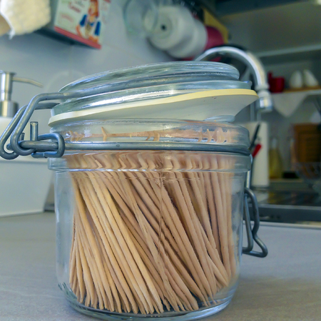 close up of toothpicks in a glass jarの写真素材