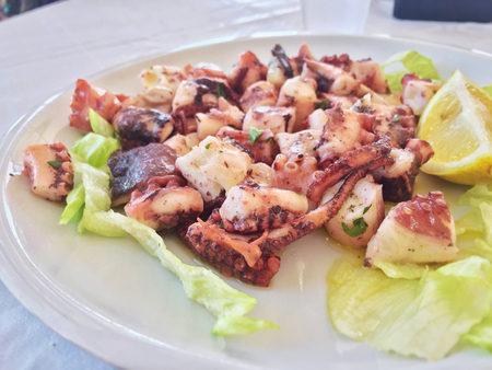Octopus salad with lettuceの写真素材