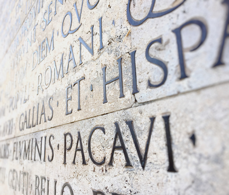 ancient roman epigraph on a marble wallの写真素材