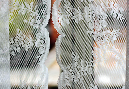 see through decorated curtains with white floral textureの写真素材