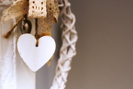 white wooden heart hangingの写真素材