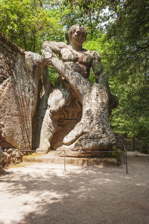 Bomarzo, VT, Italy, july 2014: Ercole e Caco (Hercules and Caco) statue in the park of the monsters in Bomarzo, Italy. It represents the struggle between the two giants, Hercules and Caco.のeditorial素材