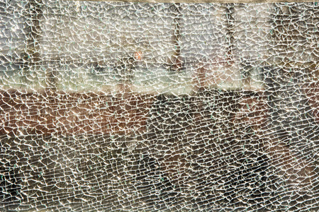 Close up of a broken tempered glass