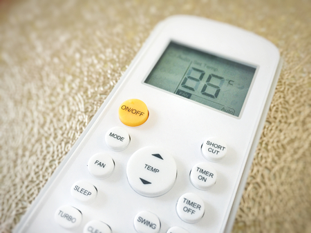 Display of an air conditioner remote control with temperature set at 26 degreesの写真素材