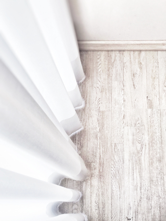 Wooden parquet floor with white curtains. Interior design detailの写真素材