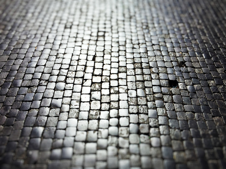 Ancient cobblestone pavement in Rome. Pattern effectの写真素材