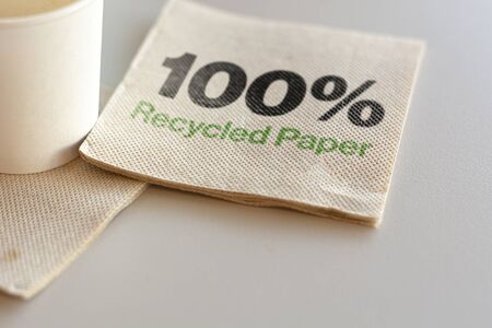 napkins made entirely of recycled paper. Eco sustainable napkin. Environmental protection. 100% recycled paperの写真素材