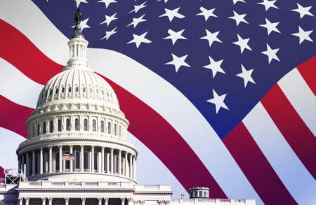the US Capitol in Washington with the American flag waving in the background. Patriotism and...