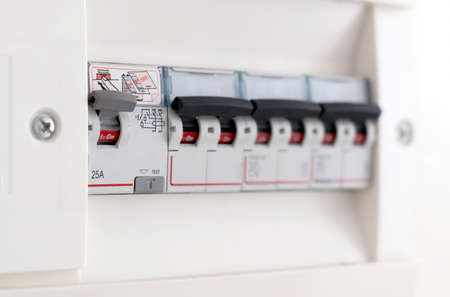 Detail of a switch in a domestic fuse box. Household electric utility. Automatic safety and...