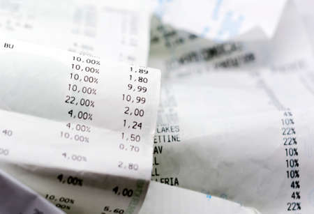 a paper receipt with the list of economic issues. Business and economics. Family financial budgetの写真素材
