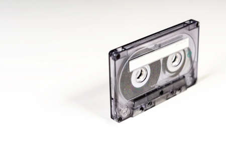 Transparent 90 minute audio cassette with blank adhesive label. Side A of the cassette. Magnetic...
