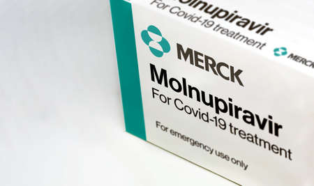New York, USA, October 2021: Merck Covid-19 Molnupiravir treatment box isolated on a white background. Health and prevention.のeditorial素材