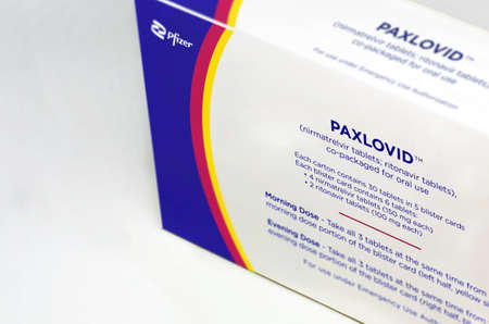 New York, USA, January 2022: Pfizer Covid-19 Paxlovid treatment box isolated on a white background....