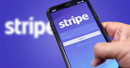 San Francisco, CA, USA, March 15, 2021: Stripe's application login page on the screen of a hand held...