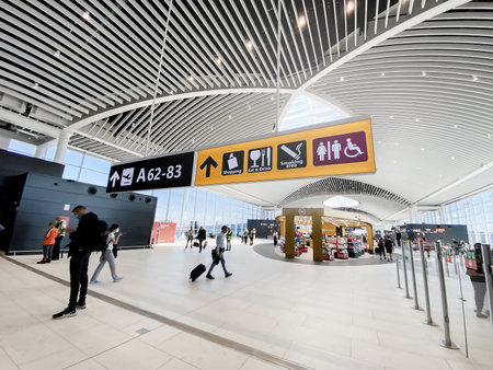 Rome, Italy, May 2022: People walking in the new departure hall of Leonardo Da Vinci Airport in Fiumicino, Romeのeditorial素材