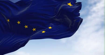 The state flag of Alaska waving in the wind. Alaska is a U.S. state located in the Western United...