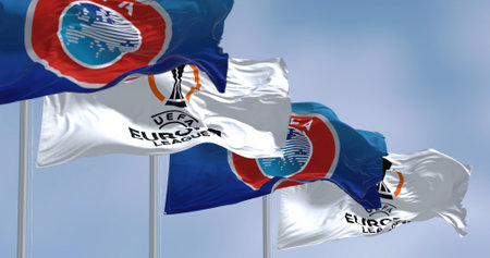 Budapest HUN, July 2022: Flags with UEFA and UEFA Europa League waving in the wind. Europa League is an annual football club competition for european clubsのeditorial素材
