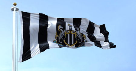 Newcastle, UK, May 2022: The flag of Newcastle United waving in the wind on a clear day. Newcastle United is an English professional football clubのeditorial素材
