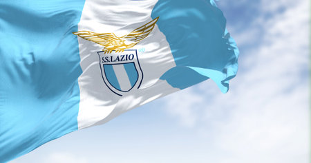 Rome, Italy, July 2022: Close up of the flag of SS Lazio waving. SS Lazio is a professional football club based in Rome. Fabric textured background. Selective focusのeditorial素材