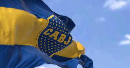 Buenos Aires, AR, Oct. 2022: The Boca Juniors flag waving in the wind. Boca Juniors is an Argentine sports club based in Buenos Aires. Selective focus. 3D illustrationのeditorial素材
