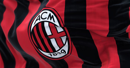 Milan, Italy, July 2022: The flag of A.C. Milan waving. Milan is a professional football club based...