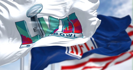 Glendale, US, Nov 2022: The flags of 57th Super Bowl, NFL and United States waving. The game is...