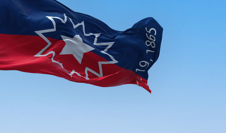 The Juneteenth flag waving in the wind. Juneteenth is a federal holiday in the United States commemorating the emancipation of enslaved African-Americans. Realistic 3d illustration. Rippled fabric.の写真素材