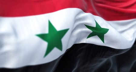 Detail of the Syria national flag waving. Horizontal tricolor red, white, black, 2 green five-pointed stars. 3d illustration render. Selective focus. Close-up. Textured backgroundの写真素材