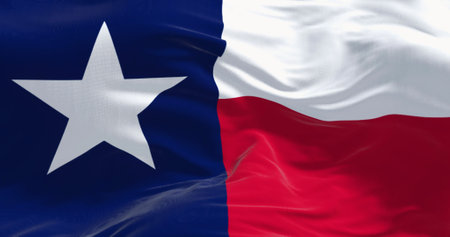 The Texas state flag fluttering in the wind. Blue vertical stripe with white star, white and red horizontal stripes. 3D illustration render. Close-up. Rippled textile backgroundの写真素材