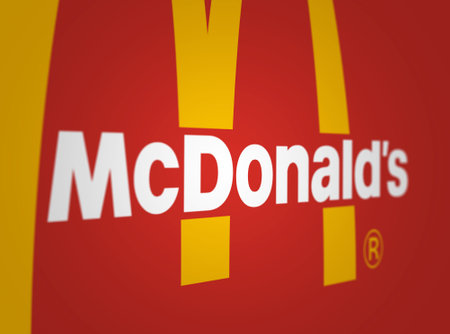 New York, US, March 2023: Mc Donald's logo on a green background. McDonald's is the world's largest fast food restaurant chain. Illustrative editorial illustration. Selective focusのeditorial素材