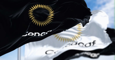 Miami, US, April 2023: Black CONCACAF flag waving in the wind on a clear day. Football government of...