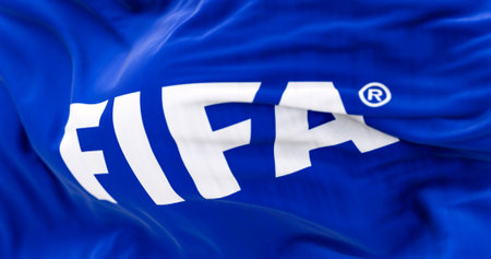 Zurich, CH, October 2022: Close-up of Fifa flag waving in the wind. International governing body of association football, beach football and futsal. Illustrative editorial 3D illustration renderのeditorial素材
