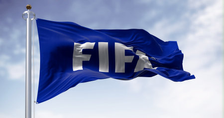 Zurich, CH, June 17 2023: Fifa flag waving in the wind on a clear day. International governing body...