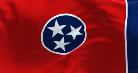 Close-up of the Tennessee state flag waving. Red field with a blue circle in the center containing three white stars. US state flag. 3d illustration render. Fluttering fabricの写真素材