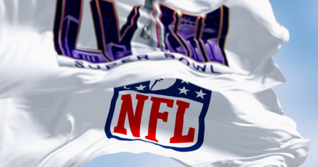 Paradise, US, June 2023: 58th Super Bowl and NFL flags waving. The game is scheduled to be played on...