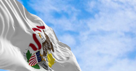 Close-up of the Illinois state flag waving in the wind on a clear day. Seal of Illinois against a white backdrop with the word "Illinois" below. 3d illustration render. Rippling fabricの写真素材