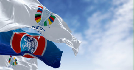 Berlin, DE, June 30 2023: UEFA and UEFA Euro 2024 European Football Championship flags waving on a clear day. International Sport event. Illustrative editorial 3d illustration renderのeditorial素材