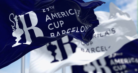 Barcelona, SP, Jan. 9 2024: Flags of the America's Cup waving in the wind on a clear day. The 37th...