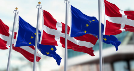 National flags of Denmark and of the European Union waving in the wind. 3D rendered illustration. Selective focus. Fluttering fabric. EU membershipの写真素材