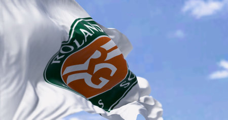 Paris, FR, Mar 5. 2024: Roland-Garros flags waving in the wind on a clear day. French Open is a major tennis tournament scheduled in late May each year. Illustrative editorial 3d illustration renderのeditorial素材