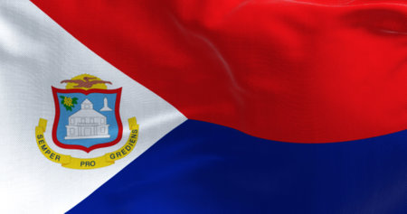 Close-up of Sint Maarten flag waving in the wind on a clear day. Constituent country within the Kingdom of the Netherlands. 3d illustration render. Rippling fabric.の写真素材