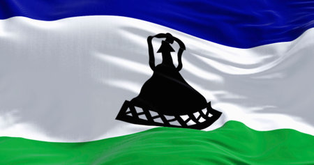 Close-up of national flag of Lesotho waving. Three horizontal bands of blue, white, and green with a black Basotho cap in the middle. 3d illustration render. Fluttering fabric. Textile backgroundの写真素材