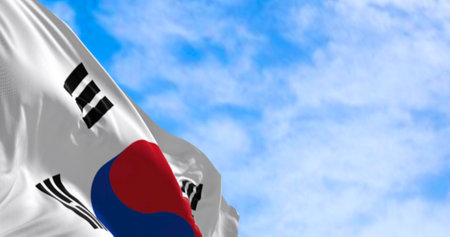 Close-up of South Korea national flag waving in the wind. White field, red-blue Taegeuk center, four black trigrams. 3d illustration render. Fluttering fabric. Textured rippled backgroundの写真素材