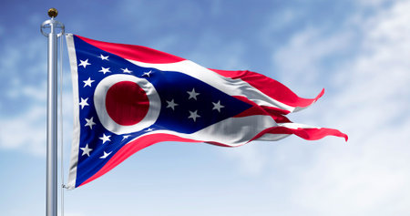 The Ohio state flag waving in the wind on a clear day. 3D illustration render. Rippled fabric. Selective focusの写真素材