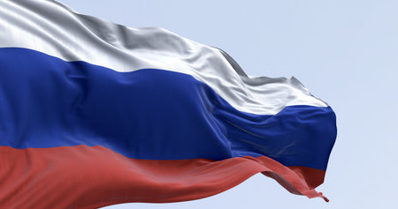 Close-up of Russia flag waving in the wind on a clear day. White, blue and red horizontal stripes. Russian Federation flag. 3d illustration render. Rippled fabric. Selective focusの写真素材