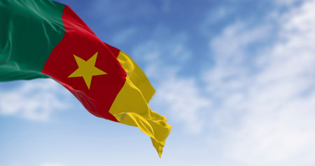 Cameroon national flag waving in the wind. Three vertical stripes of green, red, and yellow, yellow...